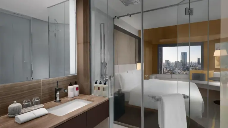 a bathroom with a sink and a glass shower at ANA InterContinental Tokyo by IHG in Tokyo