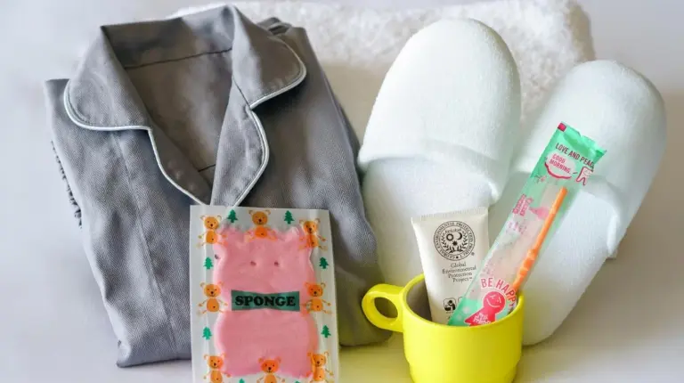 a diaper bag with a toothbrush and a cup of toothpaste at Hyatt Regency Yokohama in Yokohama