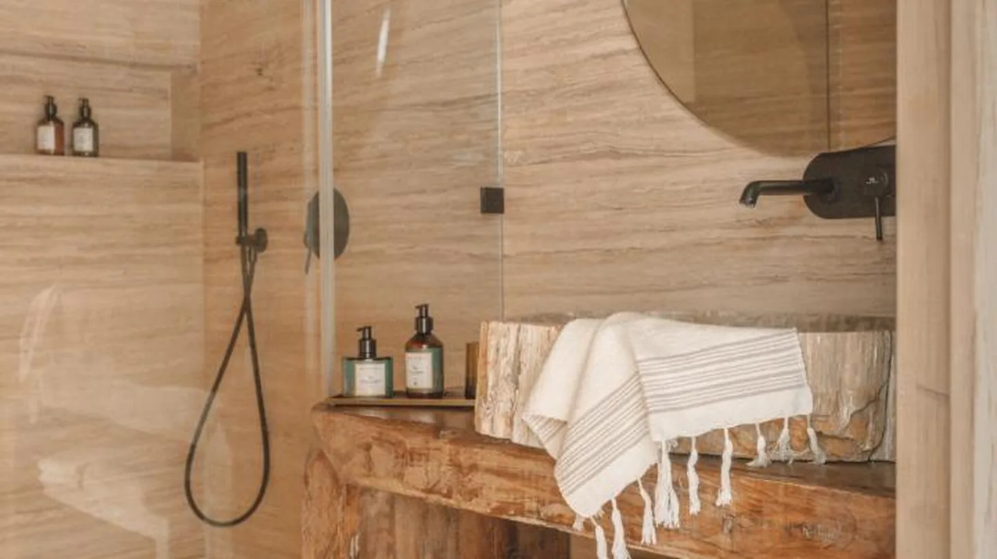 a bathroom with a shower and a mirror at Kasbah d'if in Marrakech
