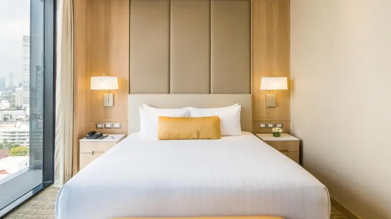 a room with a door with a baseball bat at SKYVIEW Hotel Bangkok - Sukhumvit in Bangkok
