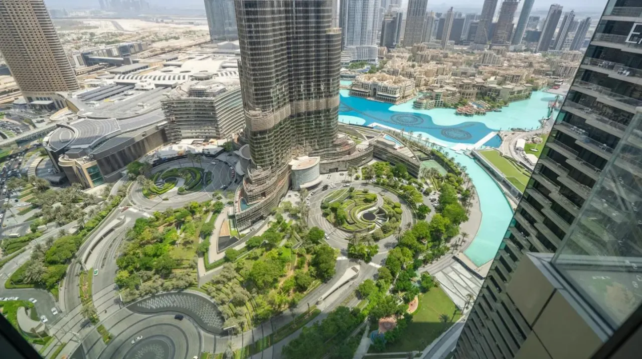 an aerial view of a city with a building at The Address Residences Dubai Opera - Luxury 3BR Stay with Stunning Burj Khalifa & Fountain Views in Dubai