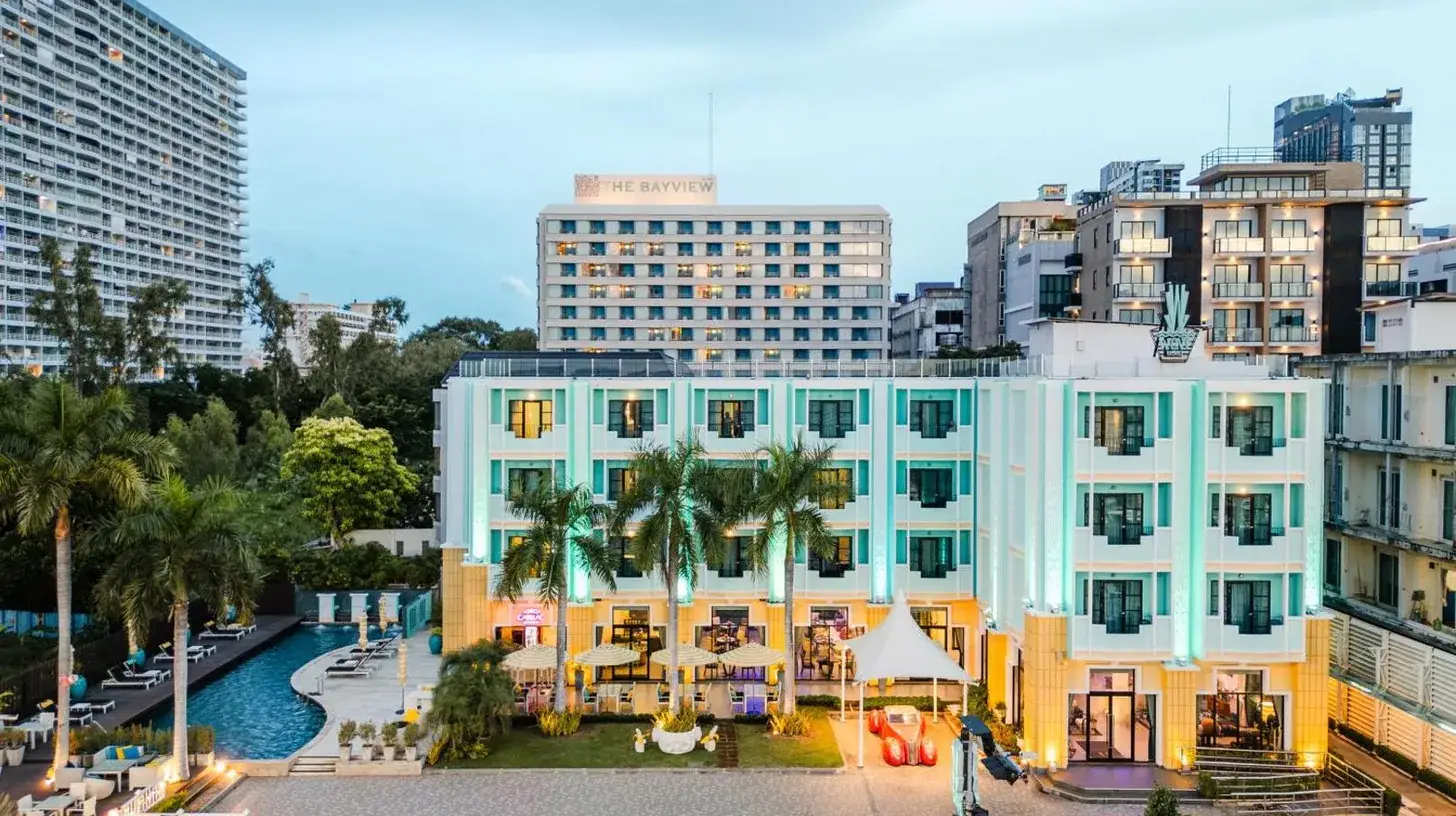 a building in the middle of a city with buildings at Wave Hotel Pattaya in Pattaya Central